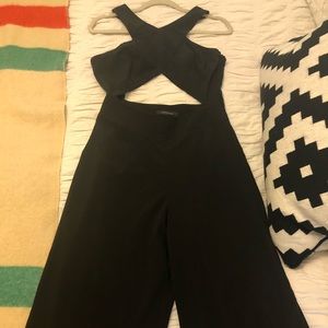 Black crisscross jumpsuit.